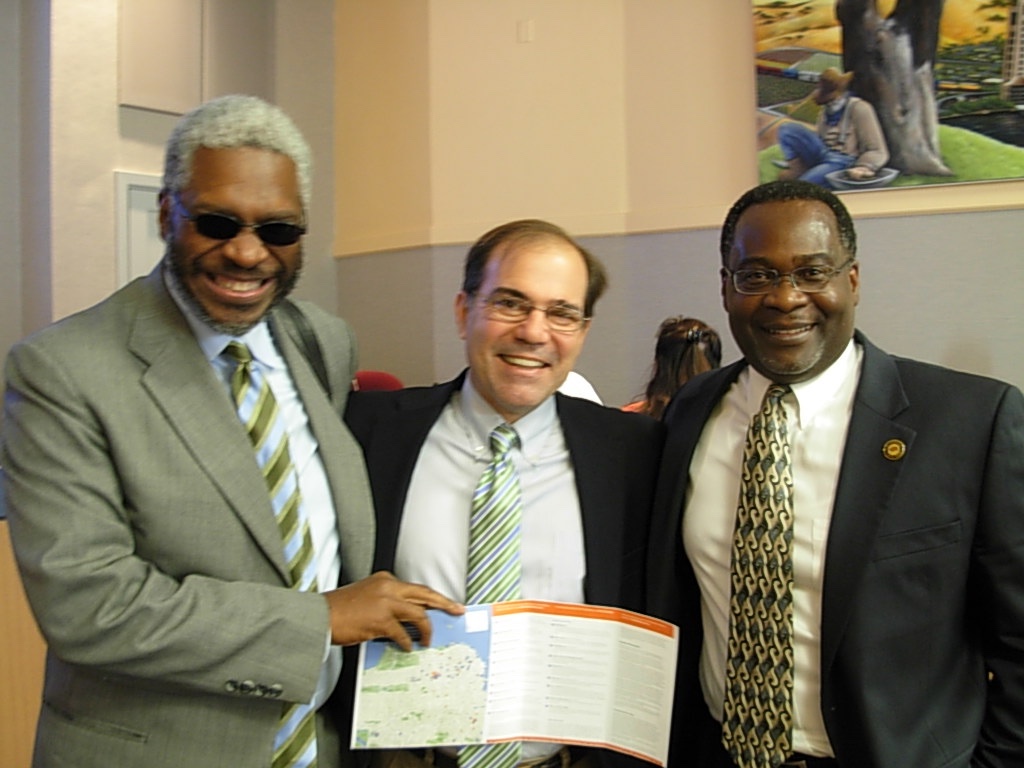 Keeper of the Register Jay Correia and Historic Resources Commissioner Rick Moss with California African-American Freedom Trail brochure